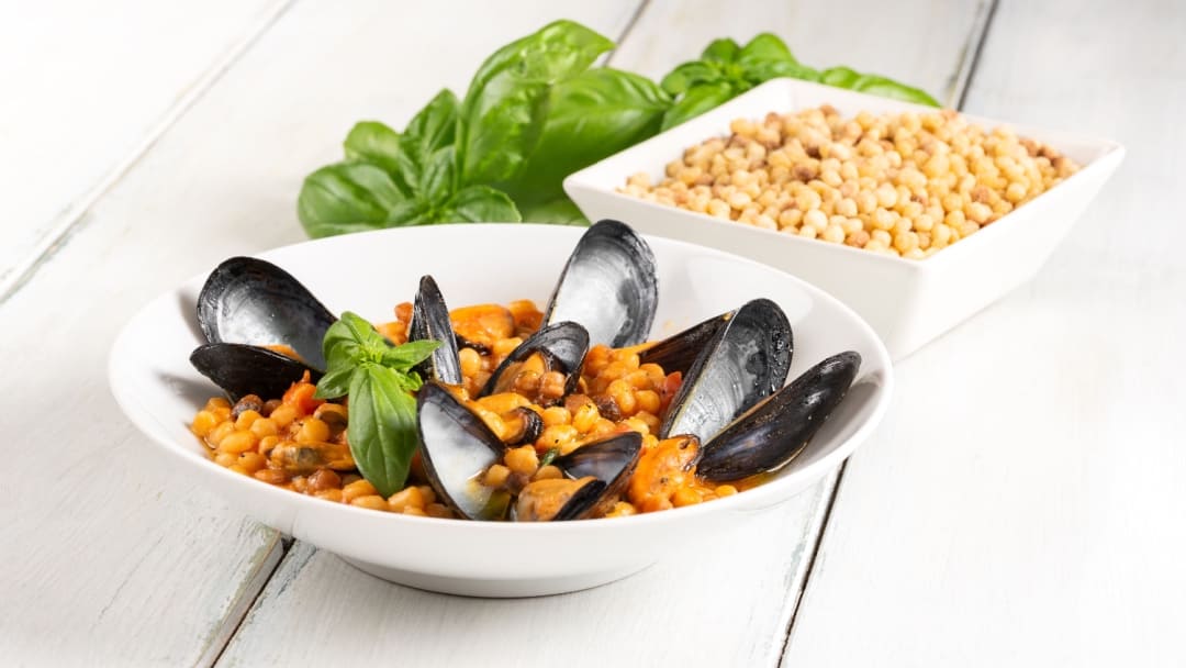 Come si fa la Fregula con zucca e cozze?